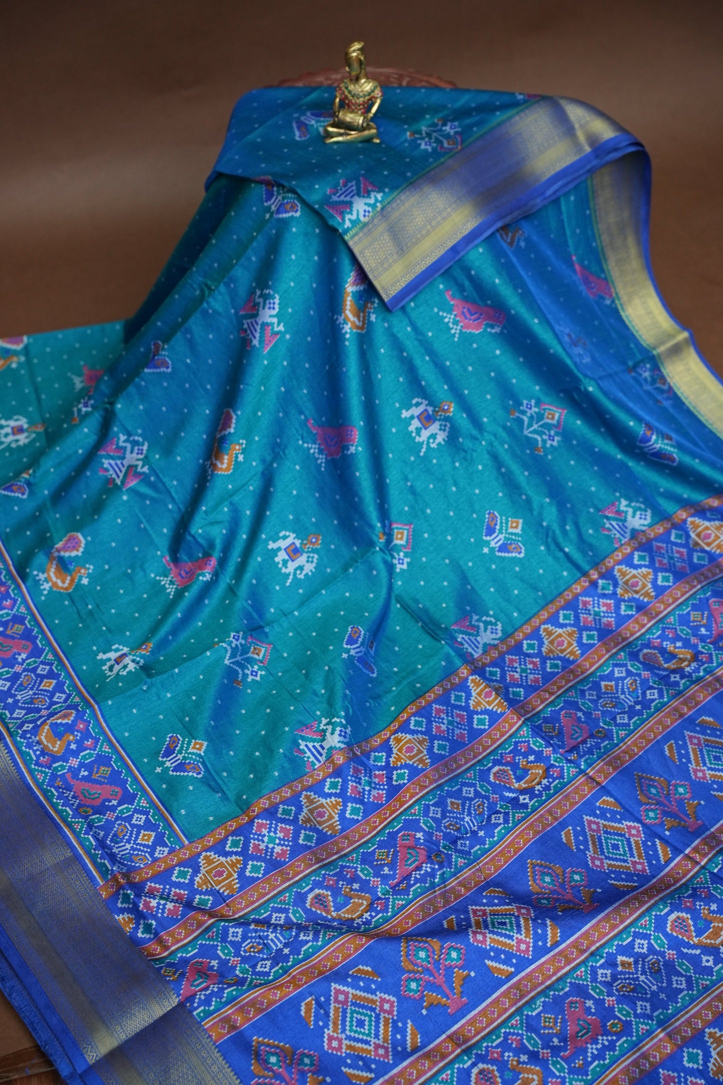 Teal Blue Semi Silk Saree with Traditional Ikat-Inspired Woven Motifs & Designer Pallu