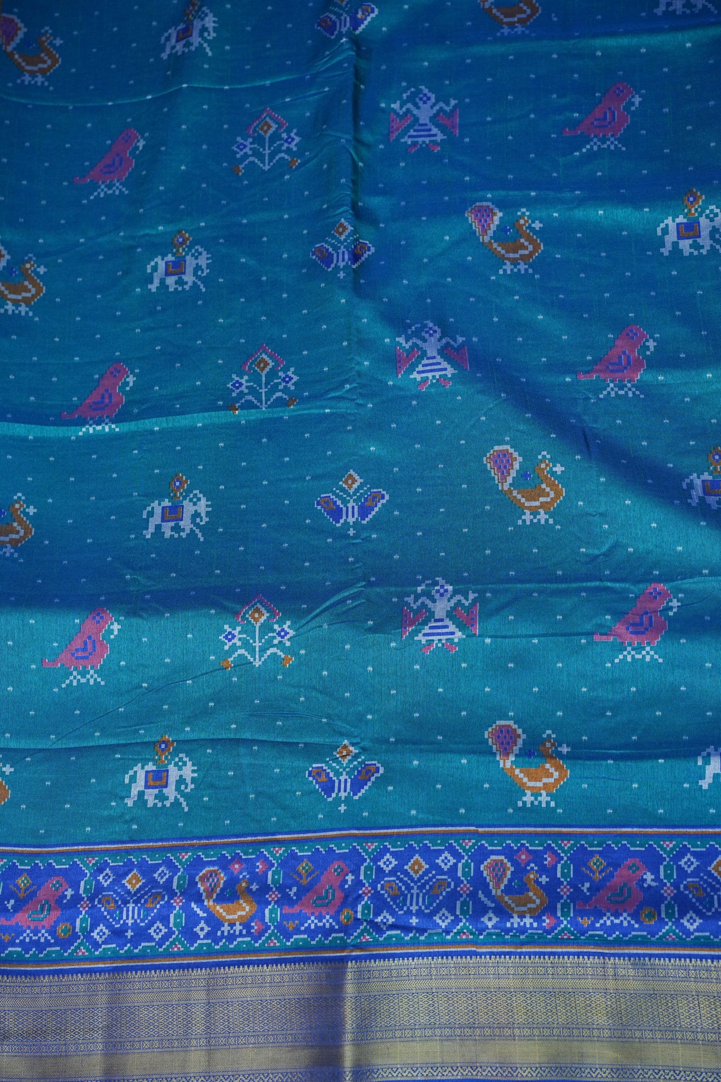 Teal Blue Semi Silk Saree with Traditional Ikat-Inspired Woven Motifs & Designer Pallu