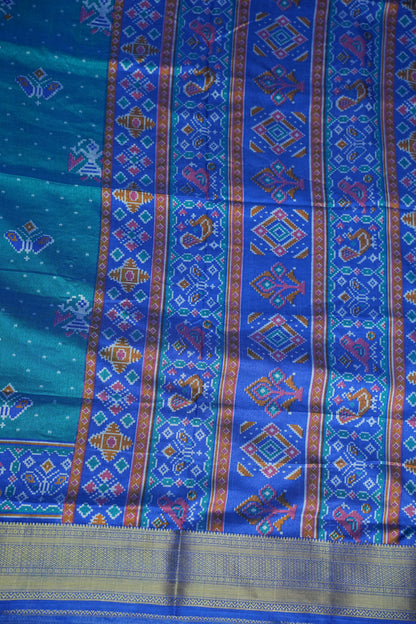 Teal Blue Semi Silk Saree with Traditional Ikat-Inspired Woven Motifs & Designer Pallu