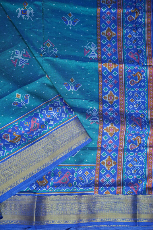 Teal Blue Semi Silk Saree with Traditional Ikat-Inspired Woven Motifs & Designer Pallu