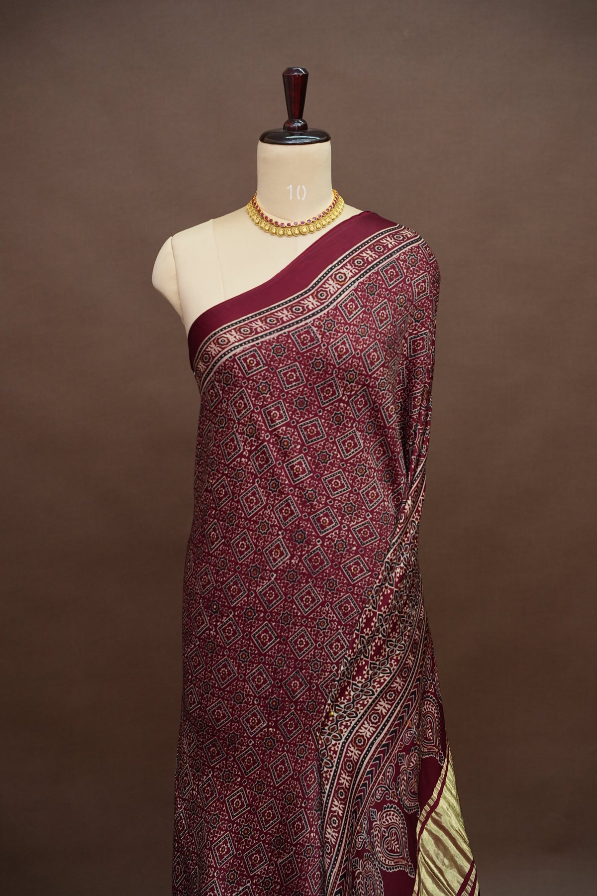 Pure Modal Silk Saree in Maroon with Bandhej-Inspired Ajrakh Print Pallu