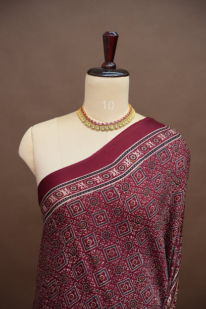 Pure Modal Silk Saree in Maroon with Bandhej-Inspired Ajrakh Print Pallu