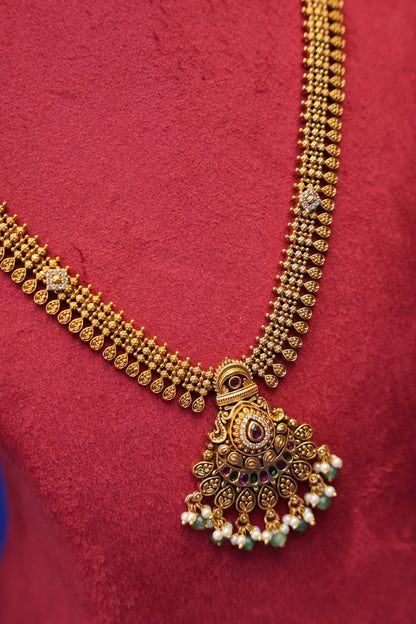 Sleek Statement Antique Long Haaram Set with Pearl & Green Bead Detailing