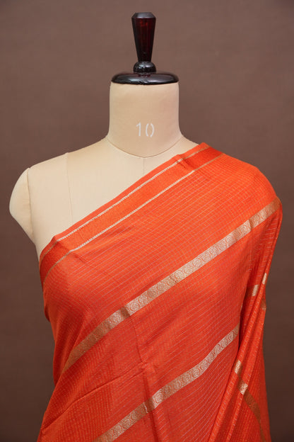 Coral Orange Crepe Silk Saree with Antique Gold Zari Border and Microchecks