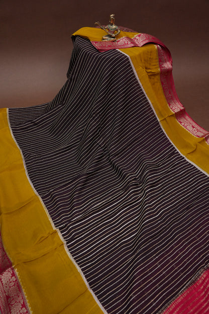Georgette Crepe Silk Saree in Black with Mustard & Red Borders