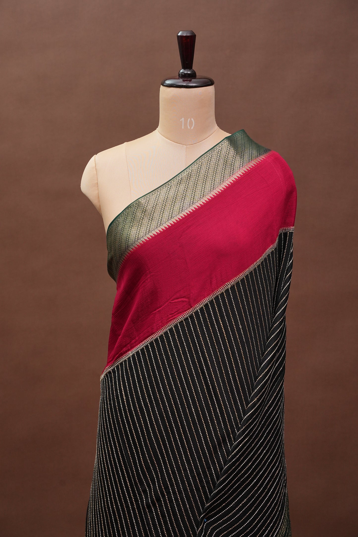 Georgette Crepe Silk Saree in Black with Red & Green Borders