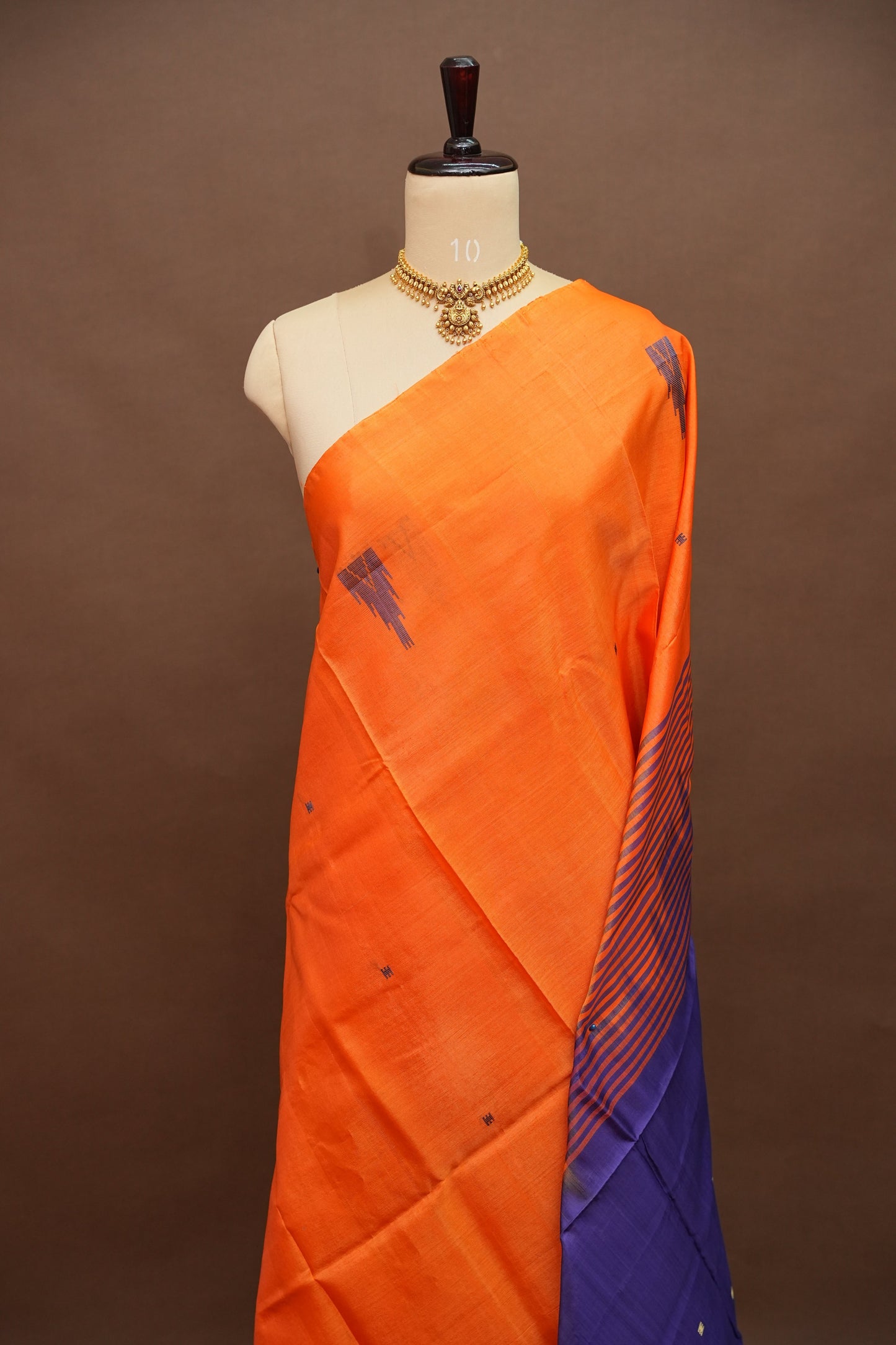 Orange Vegan Saree with Temple Motifs & Contrast Purple Pallu – Orange
