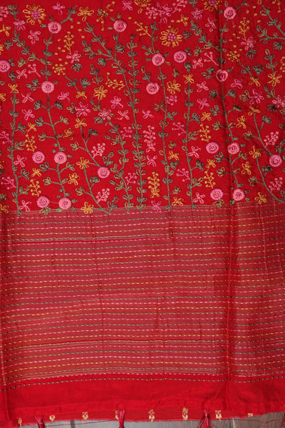 Bright Red Crepe silk saree with French knot work.