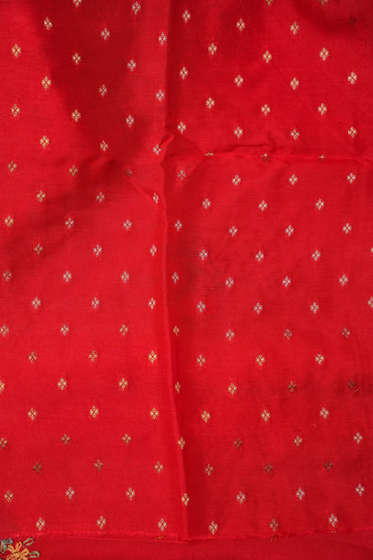Bright Red Crepe silk saree with French knot work.