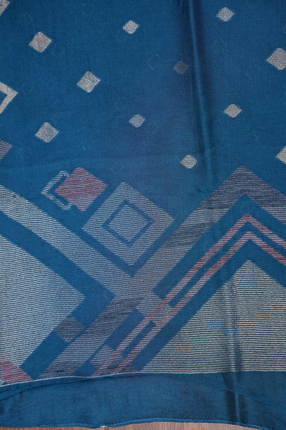 Tussar Banarasi Raw Silk Saree with Geometric Silver Weaving – Teal Blue