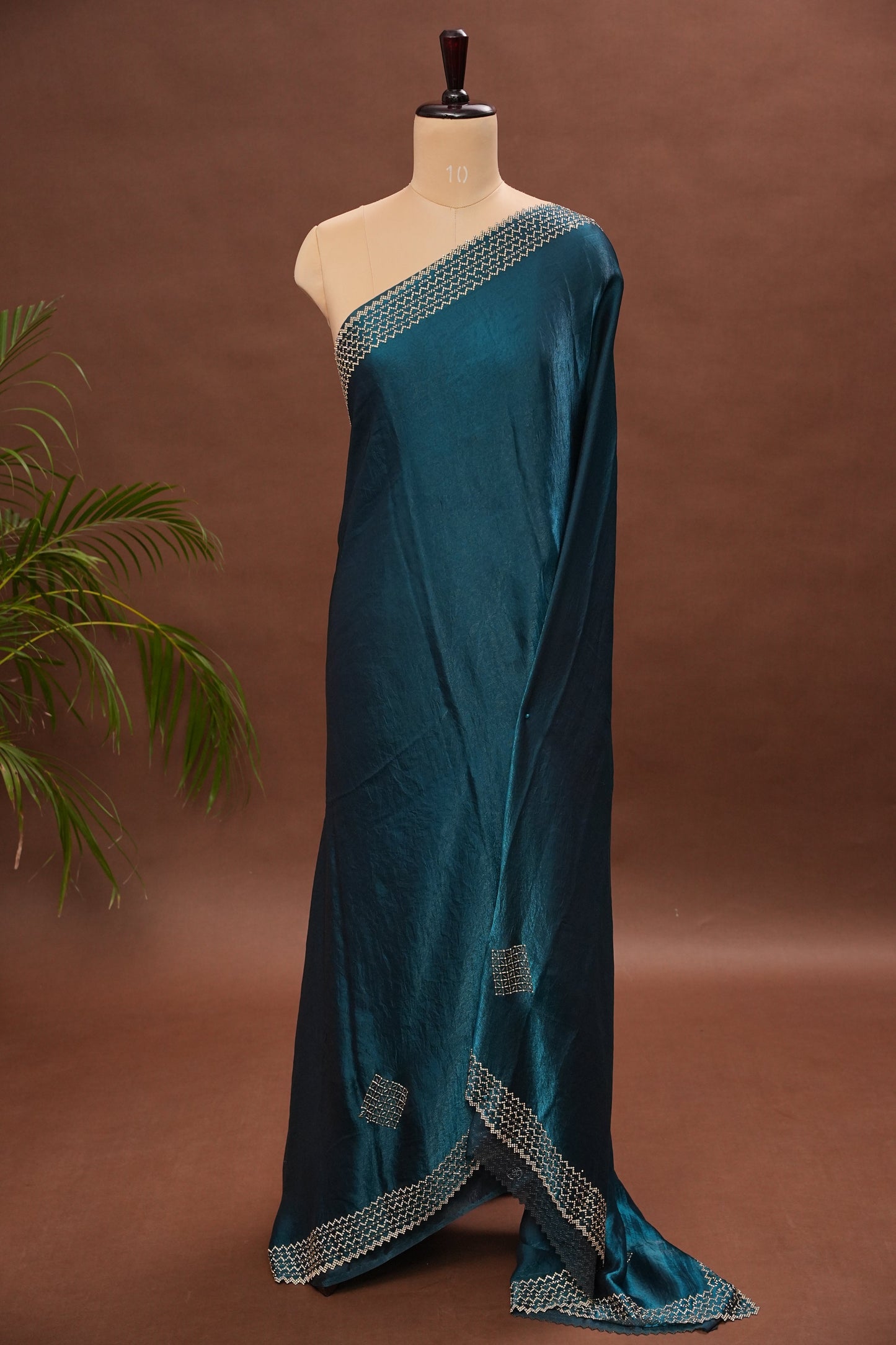 Teal Blue Party Wear Saree with Geometric Hand Embellished Detailing